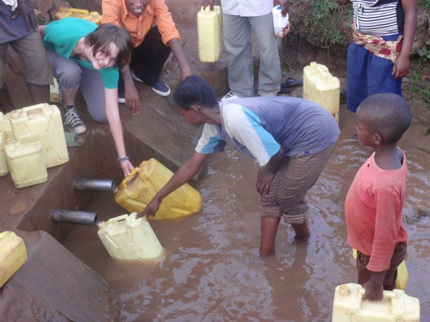 Water can in Rwanda Collecting water with the youths of the collective in Rwanda